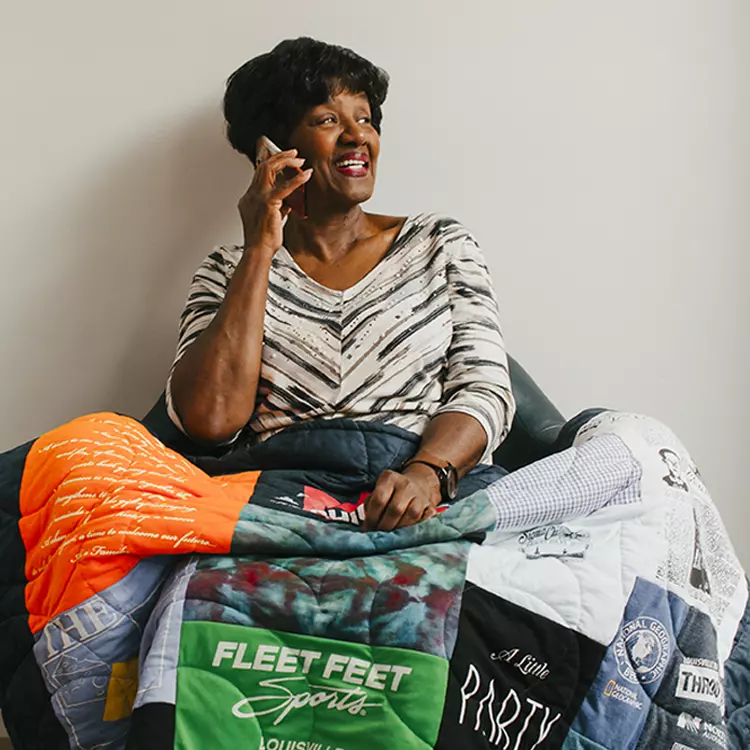 Woman with t-shirt quilt